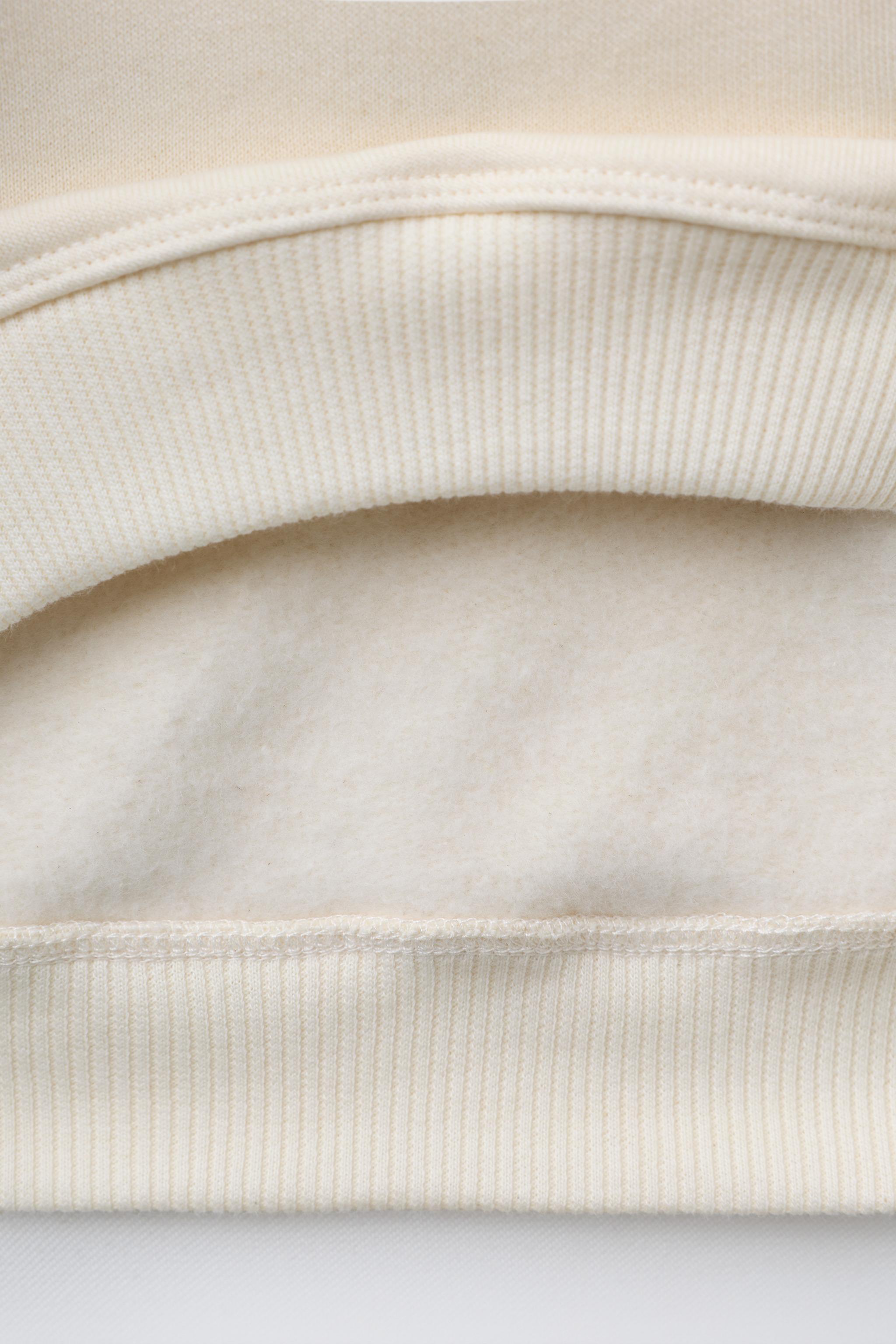 EMBROIDERED FLORAL SWEATSHIRT